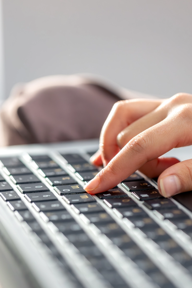 girl-is-typing-laptop-keyboard-girls-hands-keyboard